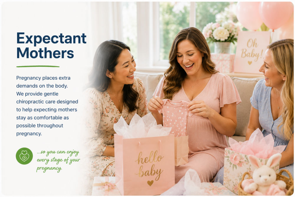 Expectant mother learning about pregnancy chiropractic care