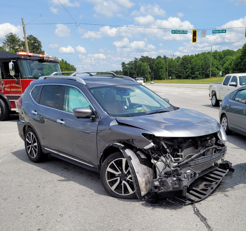 Car accident scene representing personal injury chiropractic care in Buford Georgia